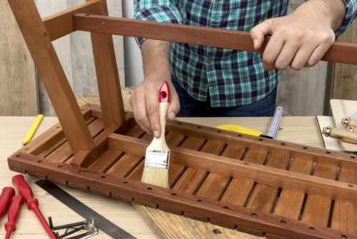 skilled-carpenter-worker-using-his-tools-wood